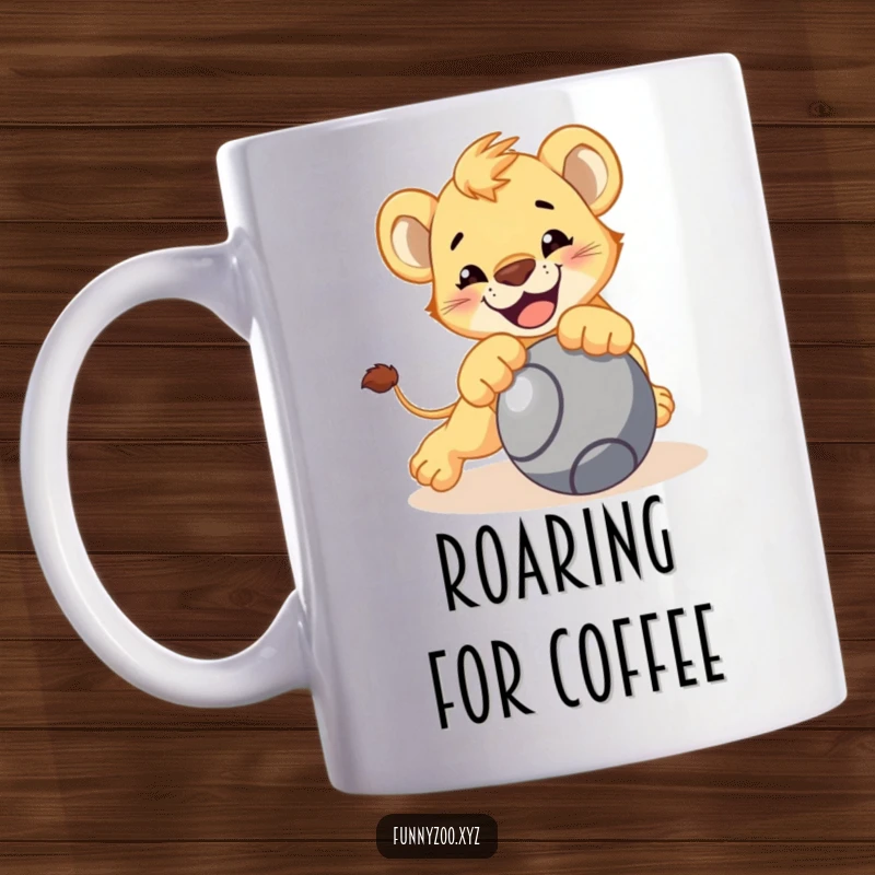 Funny lion cub mug with character playfully pouncing on a rolling ball, energetic and bold, perfect funny gift.
