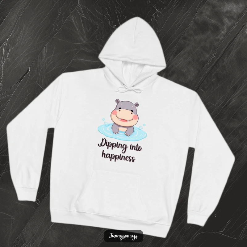 Funny Hippo Hoodie: A smiling hippo is depicted joyfully splashing in a small pool, bringing funny cheer and comfort.