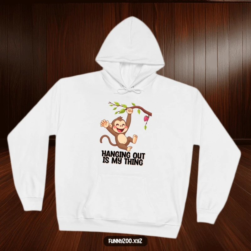 Funny monkey energetically swinging from a vine, printed on a cozy hoodie. This cartoon character brings cheer and warmth.