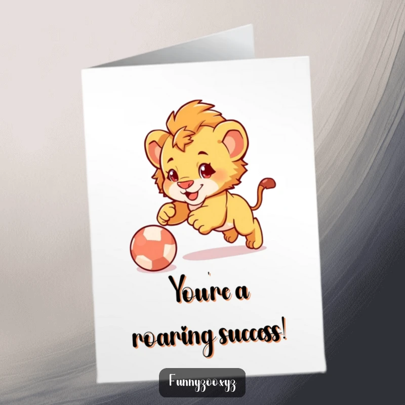 Funny Free Printable Congratulations Card: An energetic lion cub playfully pouncing with glee onto a bouncing ball, celebrating your fantastic achievement.