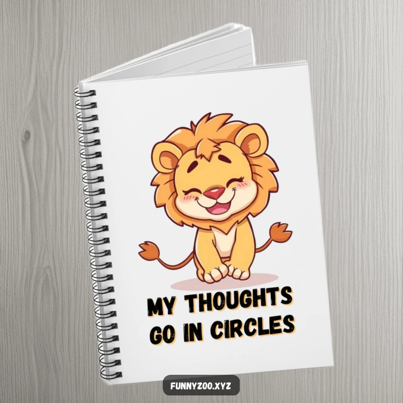 Funny Notebook: Lined pages featuring a goofy lion with a wide smile, comically chasing its own tail.