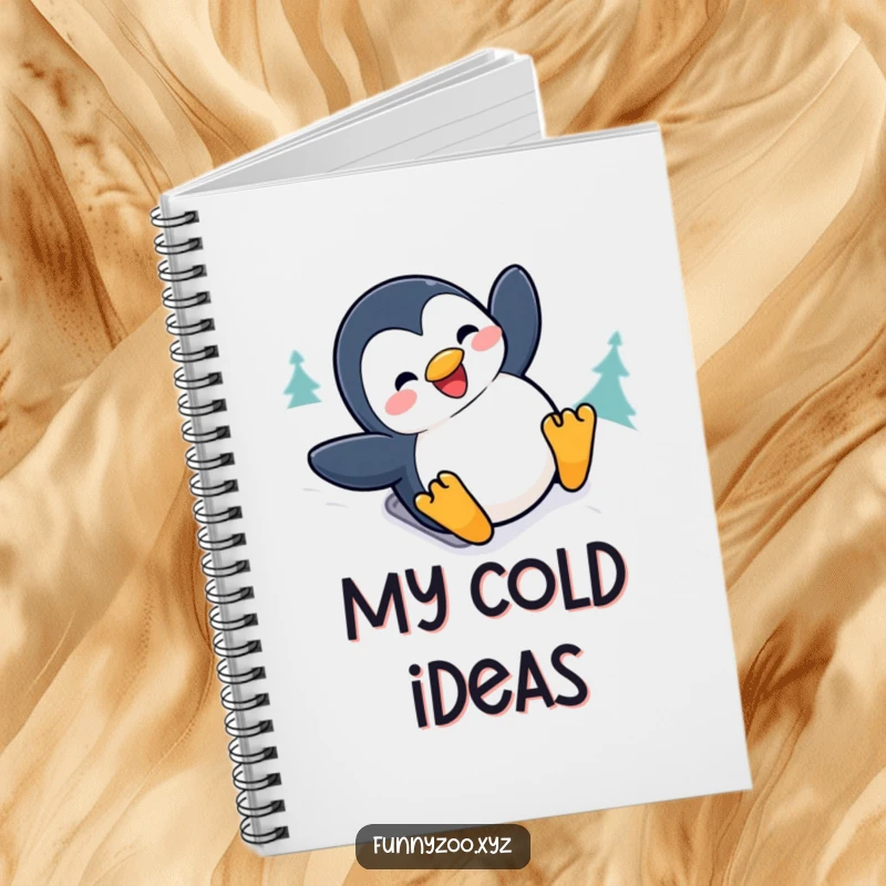 Funny penguin notebook with a joyful character sliding down a snowy hill with a big grin, perfect for humorous note-taking.
