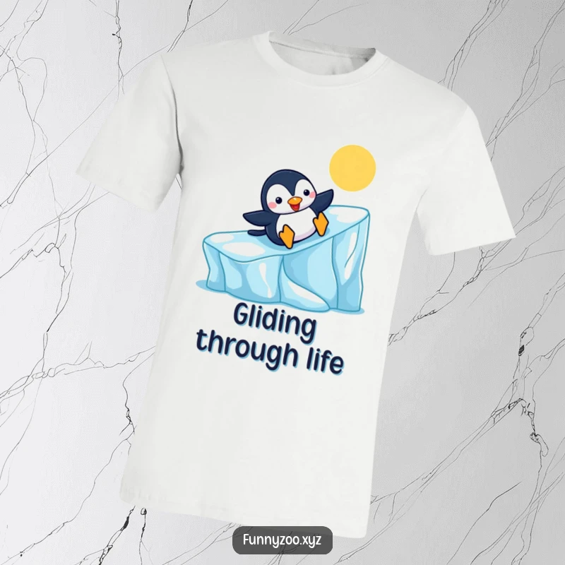 Funny Penguin T-Shirt joyfully sliding down a colorful iceberg, perfect for winter lovers and a great funny gift.