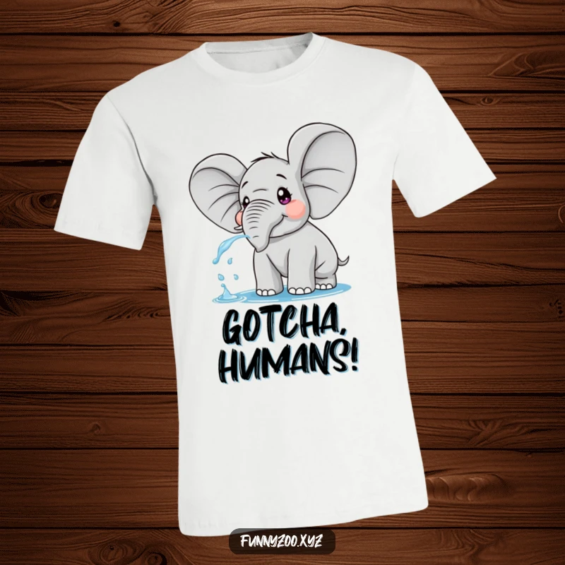 Funny t-shirt depicting a surprised elephant with comically large ears, caught mid-spray of water.