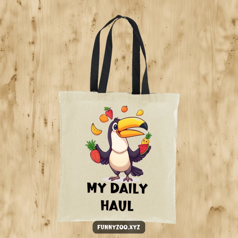 Funny Toucan Juggler Tote Bag: Cute bird character comically juggling an array of colorful fruits, perfect for carrying essentials.